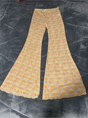 Dippin' Daisy's Floral Bell Bottom Pants in Yellow, Pink, and Green